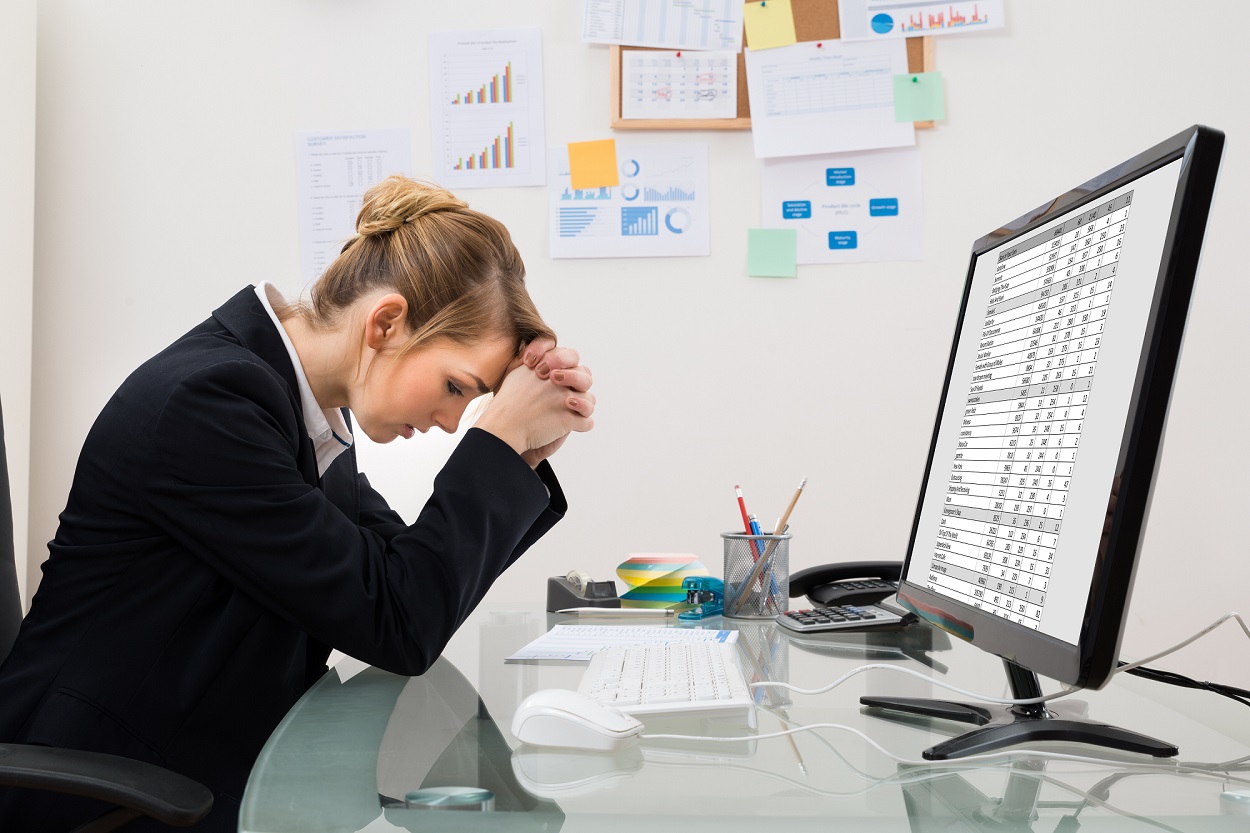 Accountant handling a heavy bookkeeping workload